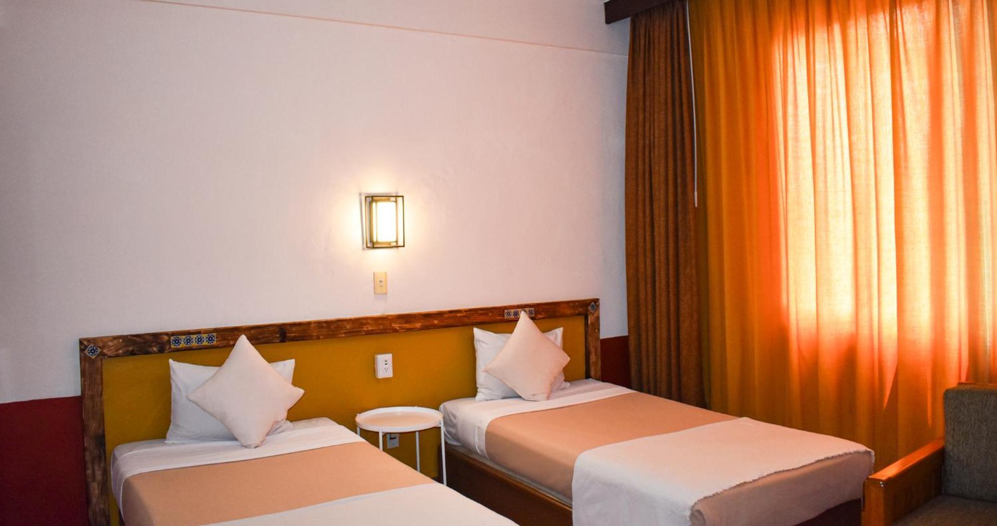 Tweepersoonskamer met 2 Aparte Bedden