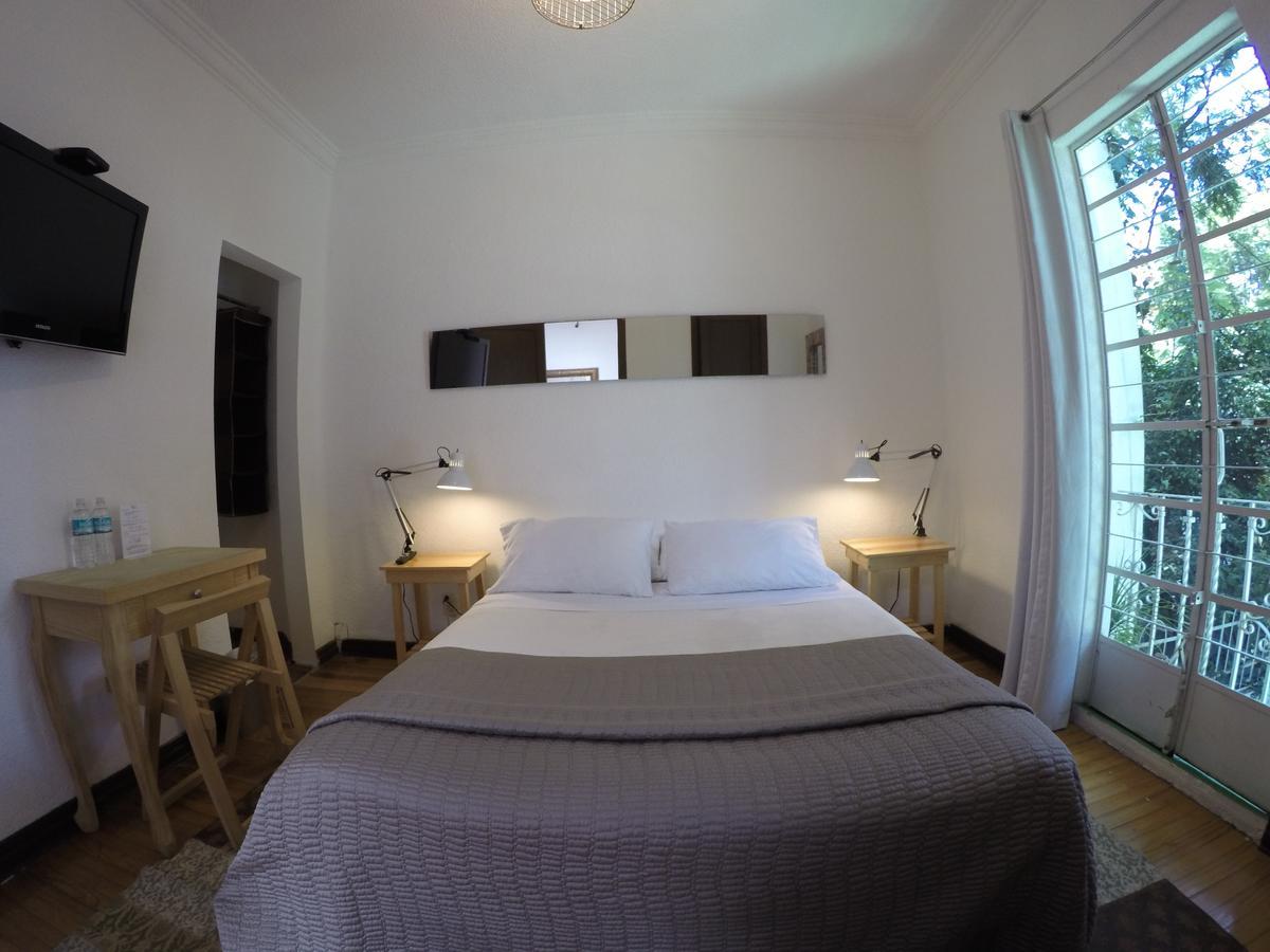 Kamer met Queensize Bed en Balkon